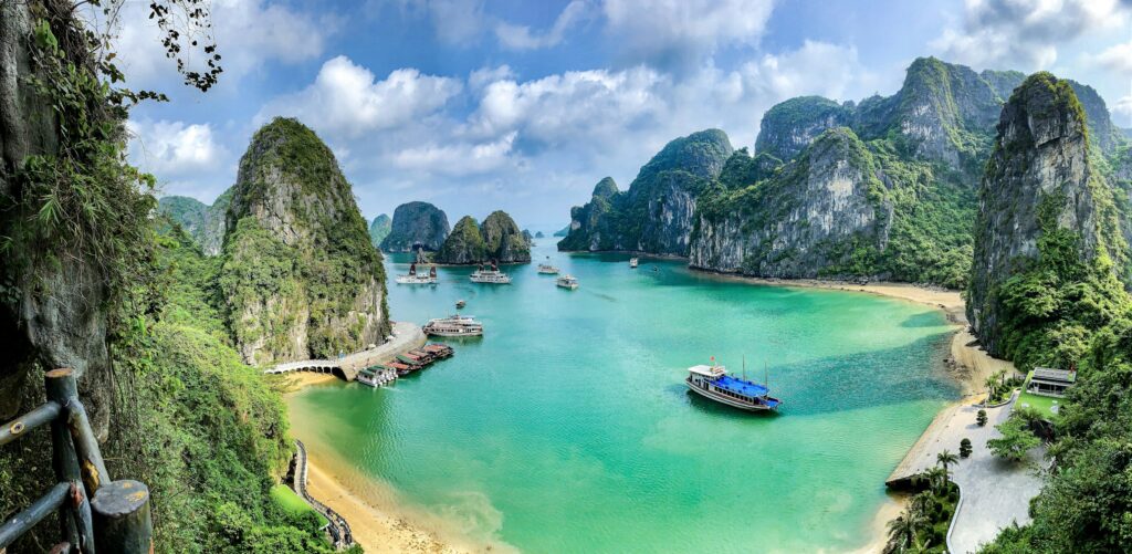 Cruise boats among the karst islands of Halong Bay