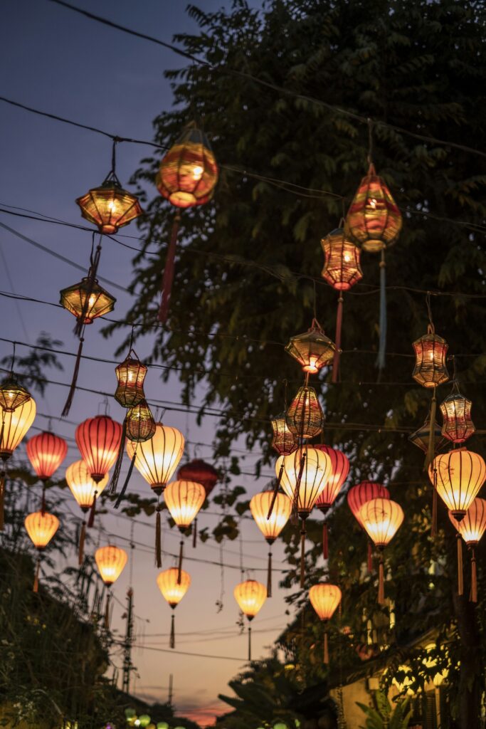 Candlelit lanterns floating on the river at Hoi An