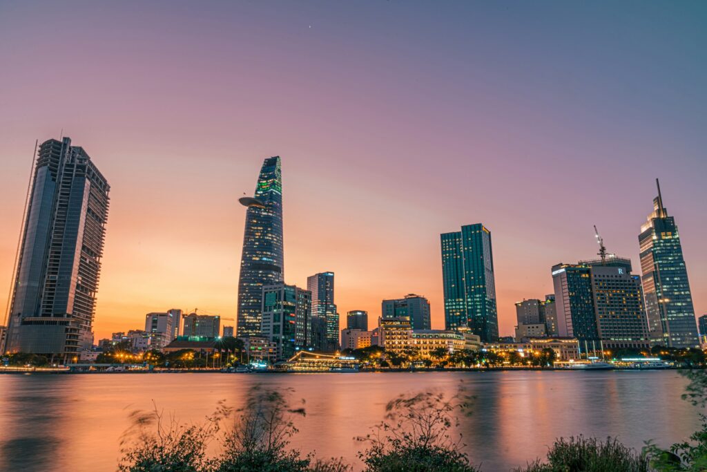 The Ho Chi Minh City skyline at dusk along the Saigon River