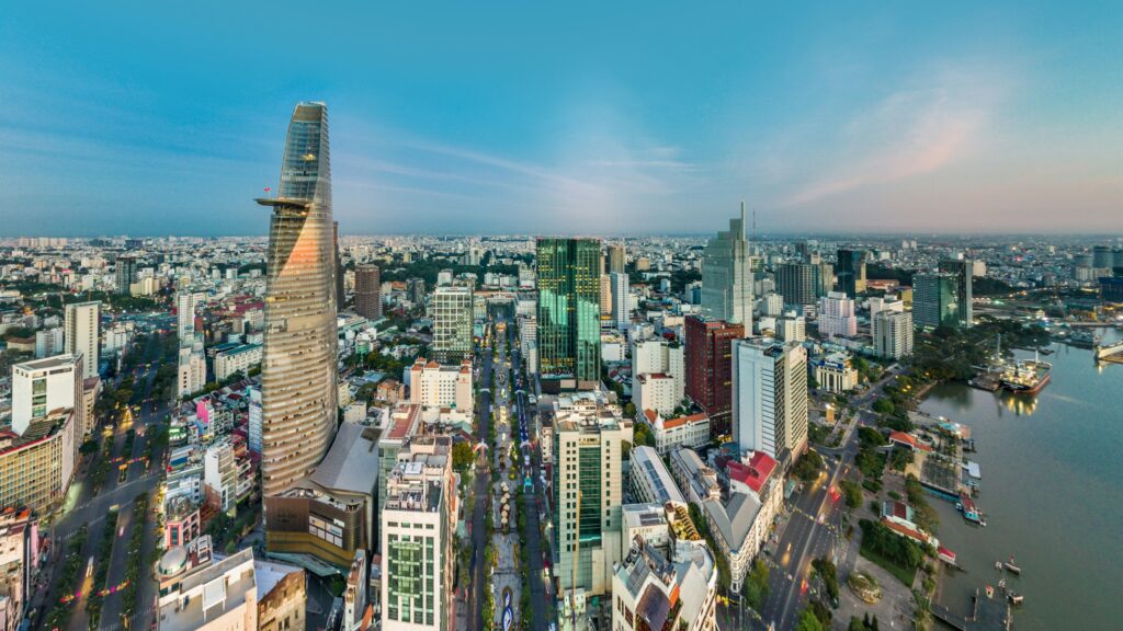 The Ho Chi Minh City skyline at dusk along the Saigon River
