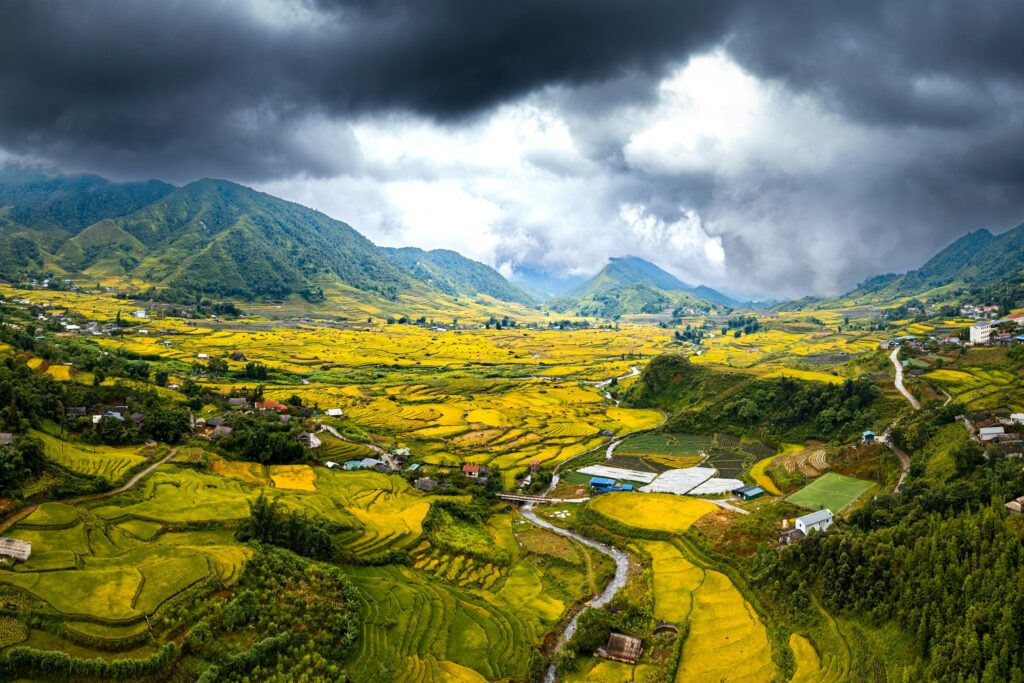 Aerial view of green mountain valleys and rice fields in northern Vietnam