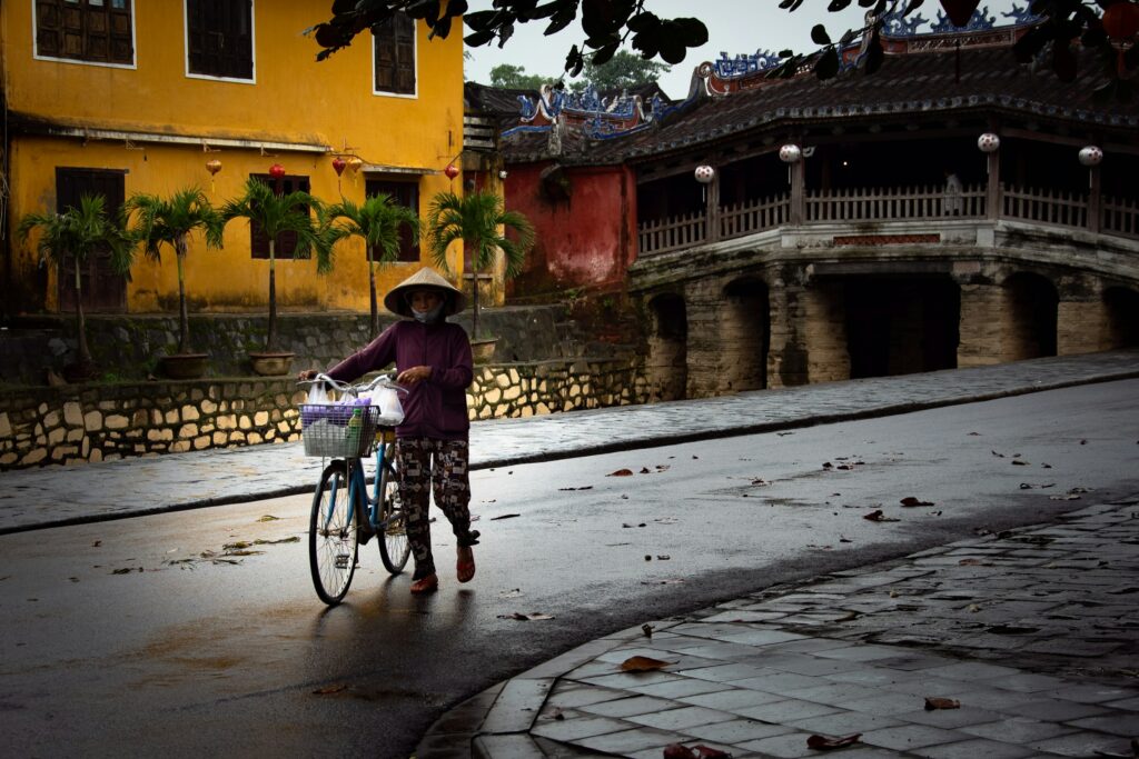 Reflections of the Japanese Bridge in the canal at Hoi An