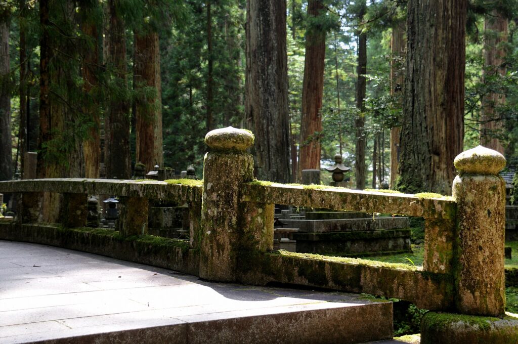 Moss-covered stone bridge in Okunoin cemetery at Koyasan