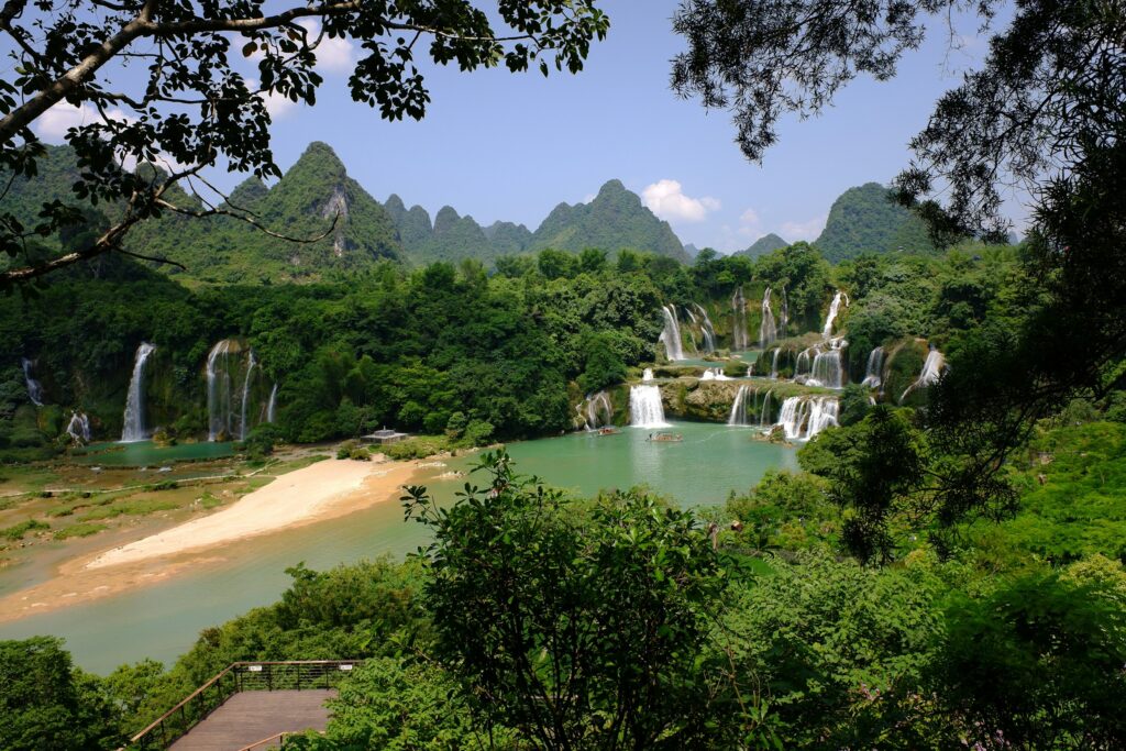 Ban Gioc waterfall flowing through limestone hills on Vietnam’s northeast border