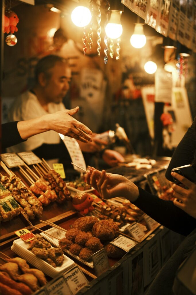 Street food stall in Nishiki Market, Kyoto — Japan's Table: A Culinary Journey