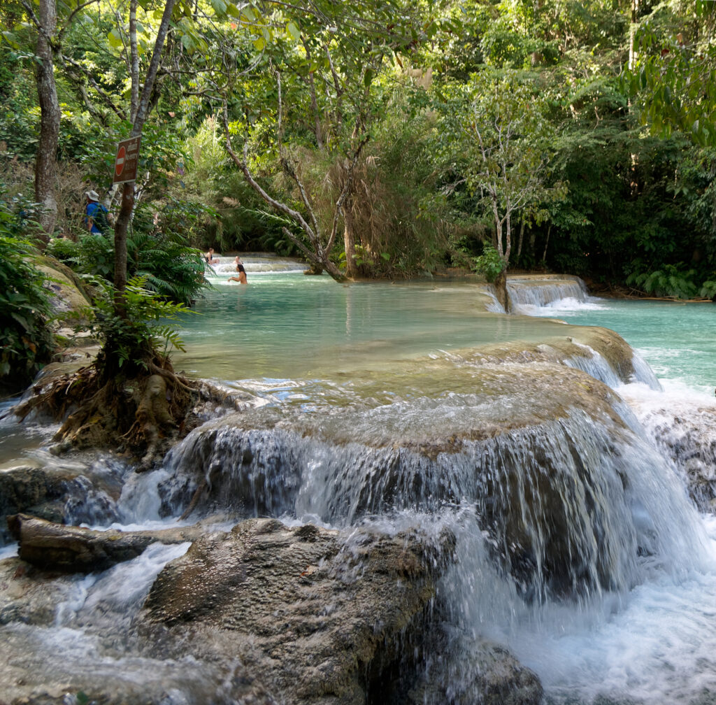 Tiered turquoise pools of Kuang Si falls
