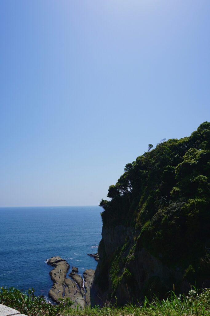 Haesu Gwaneum coastal statue ocean cliff backdrop no buildings
